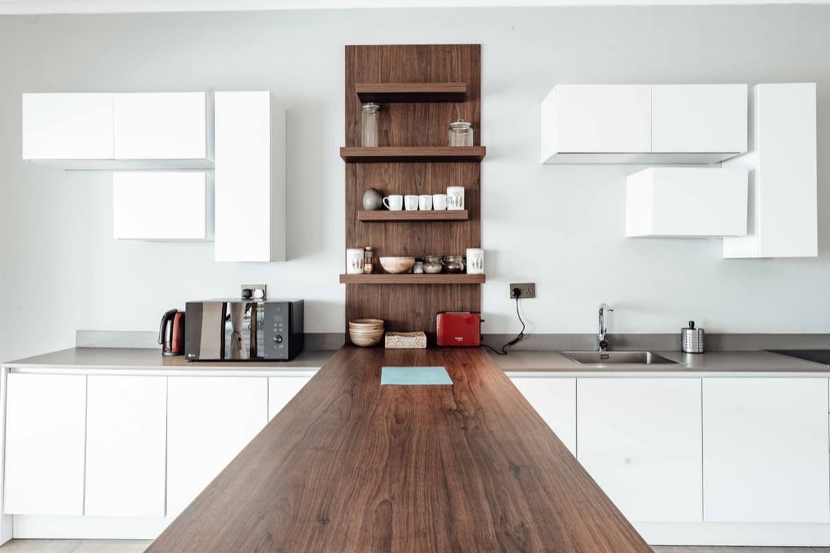 Kitchen with utilities and appliances set up and operational