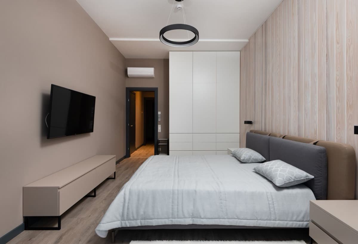 Furnished bedroom in a London residential unit prepared to a guest-ready standard